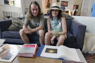 Tim Miller and Linda Troeller share their work with each other. Photo: Stephen Perloff.
