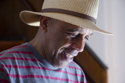 Photo Review Board member and Haverford College Professor Willie Williams has the right hat for a garden party. Photo: Stephen Perloff.